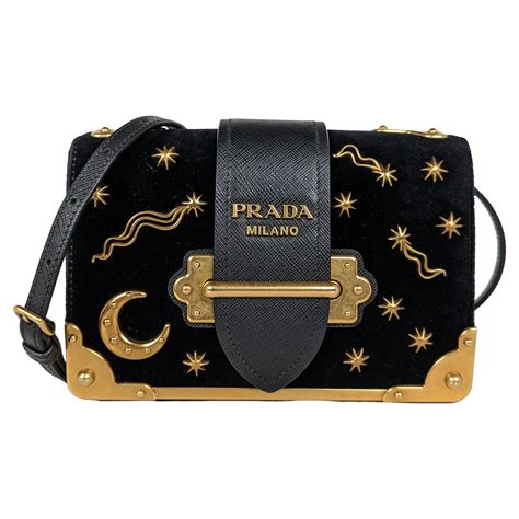 prada cahier bag astrology.